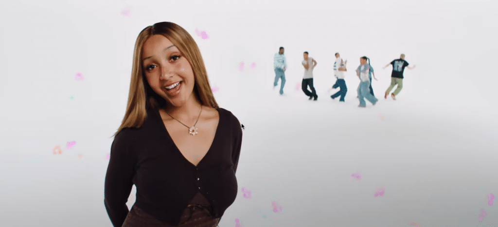 PinkPantheress smiling in her recent music video with Central Cee.