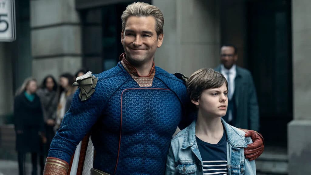 Homelander from the Boys holds a troubled Ryan by his side.