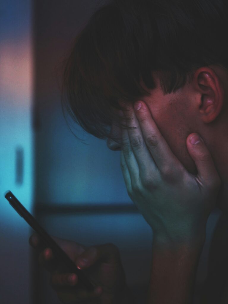 guy looking at phone