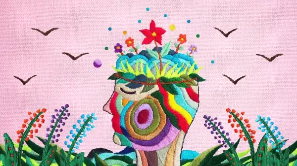 Art therapy artwork of a meditating person, improving mental health with different kinds of creative therapies.
