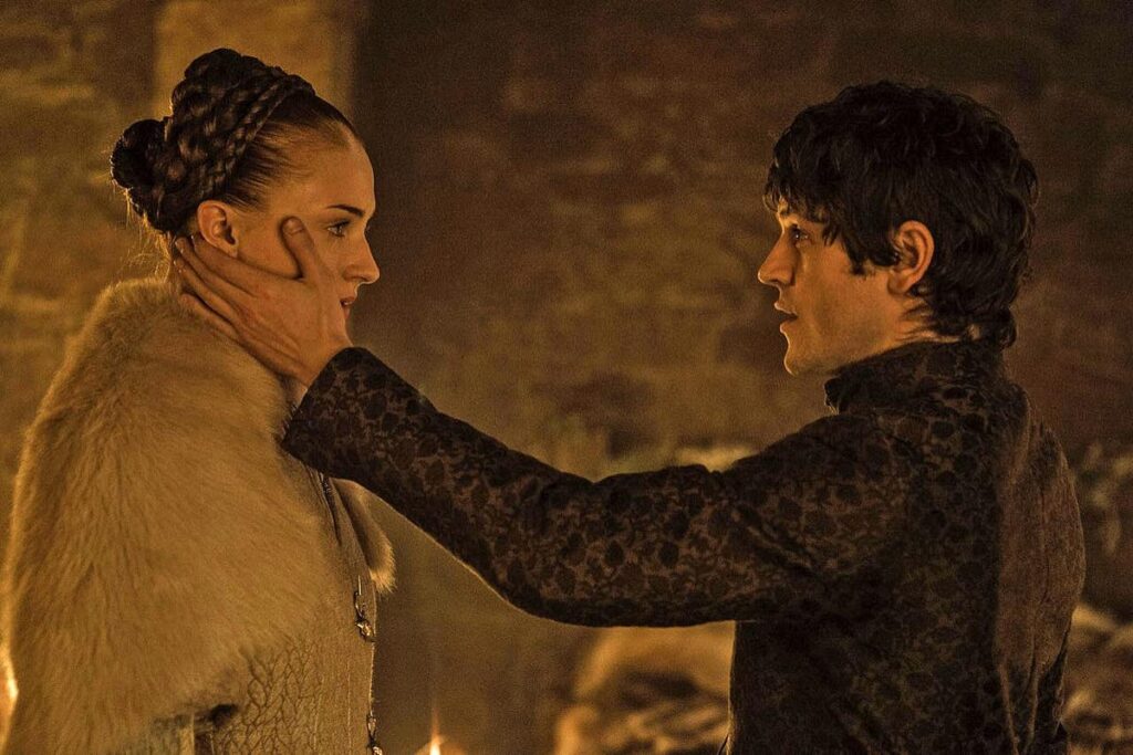 Ramsay touches Sansa's face in Game of Thrones.