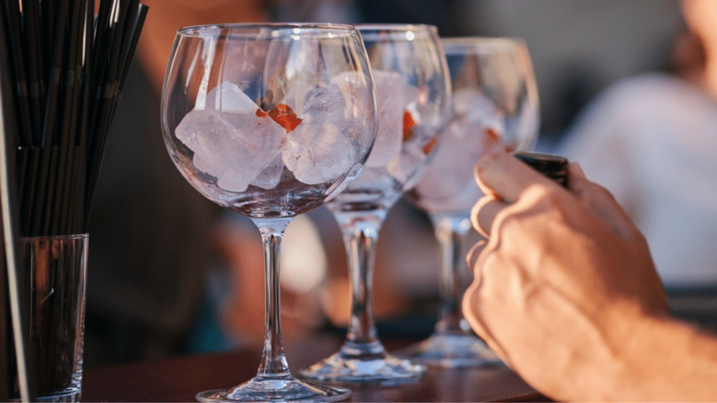 Preparing non-alcoholic gin and tonic. People are drinking less as cost of living is rising