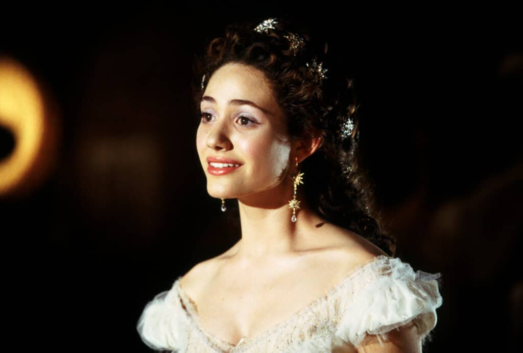 Christine smiling in The Phantom of the Opera, a must-watch movie for acting majors.