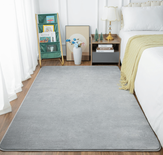 An image from amazon.com showing the back to school college dorm product: A memory foam rug.