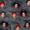 Clip of FUNERAL GREY music video with multiple Awsten, Otto, and Geoff heads on a grey sheet