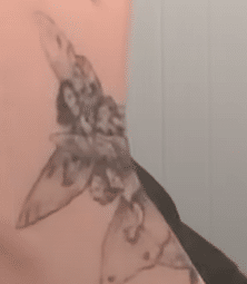 Billie Eilish's hand tattoo of three fairies
