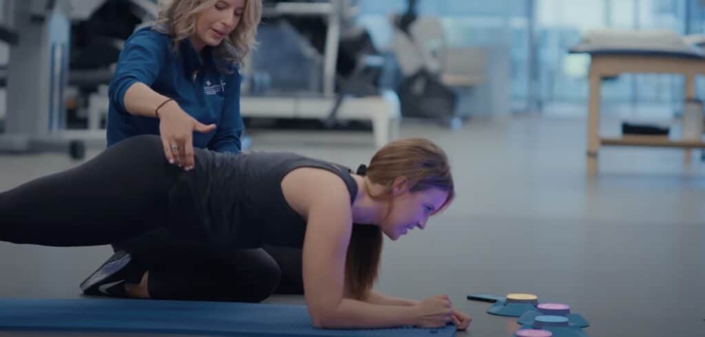A Dallas Cowboy Cheerleader in Physiotherapy due to injury