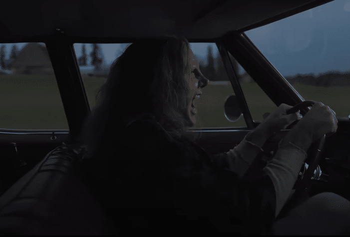 Nicolas Cage drives off to commit more mayhem in 'Longlegs'.