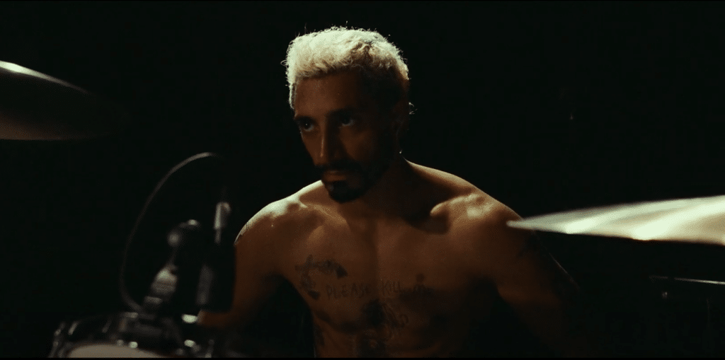 man playing drums.