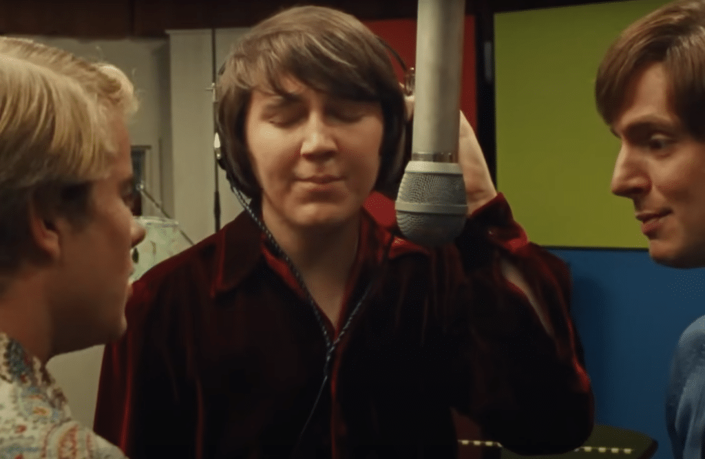 man is singing in studio