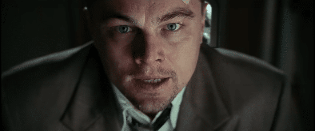 Leonardo DiCaprio's character Teddy staring.