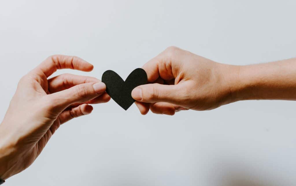 Hands holding a heart