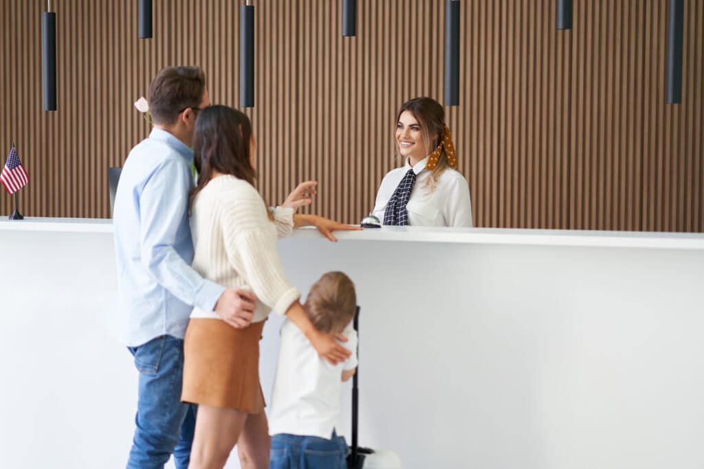 Part-Time Receptionist helping customers