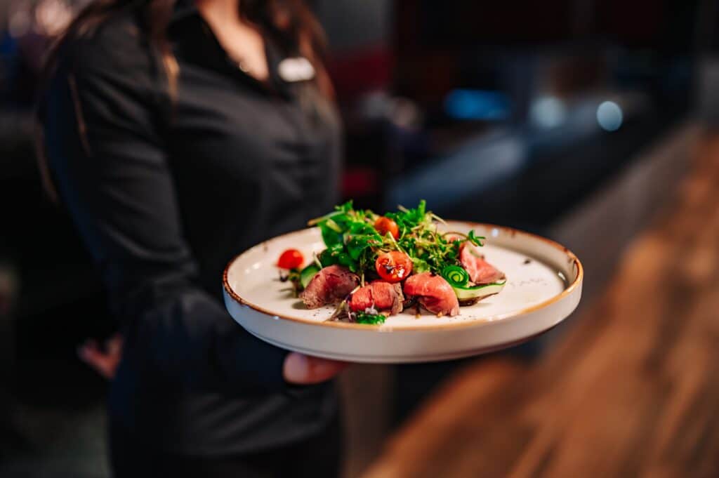 A waitress serving food