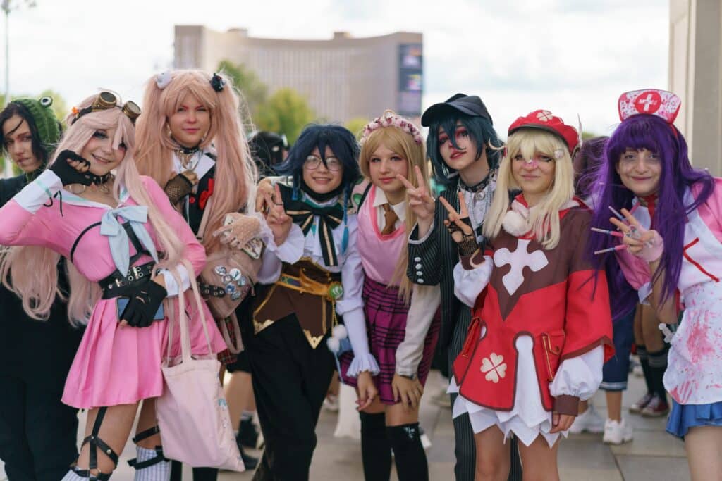 People walking in the public park in autumn day. Youth cosplay. Lifestyle concept