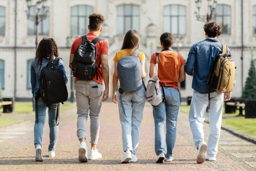 Group of college friends walking.