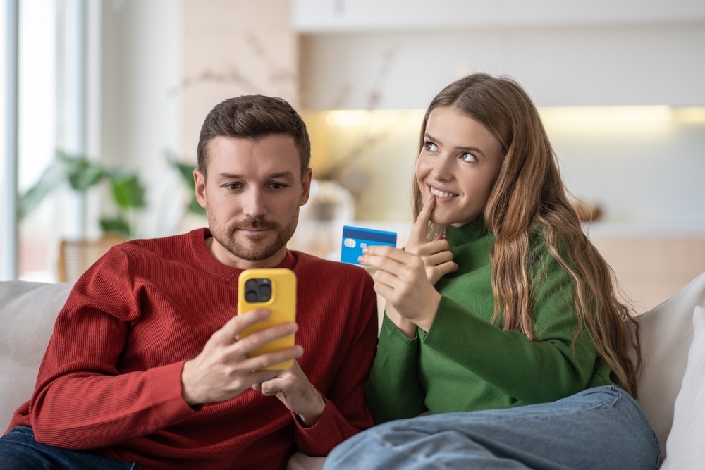 man buying woman things and she is in her feminine energy.