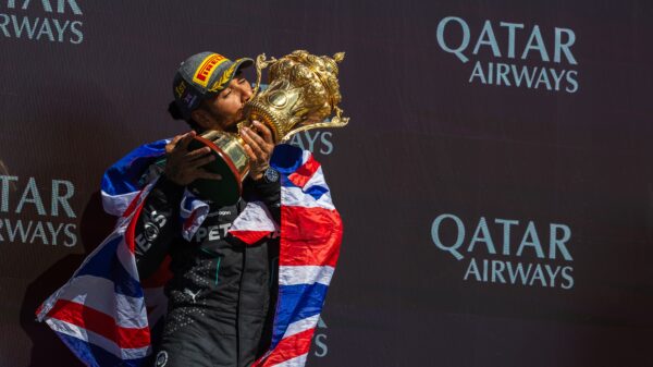 Lewis Hamilton with the trophy at Silverstone 2024