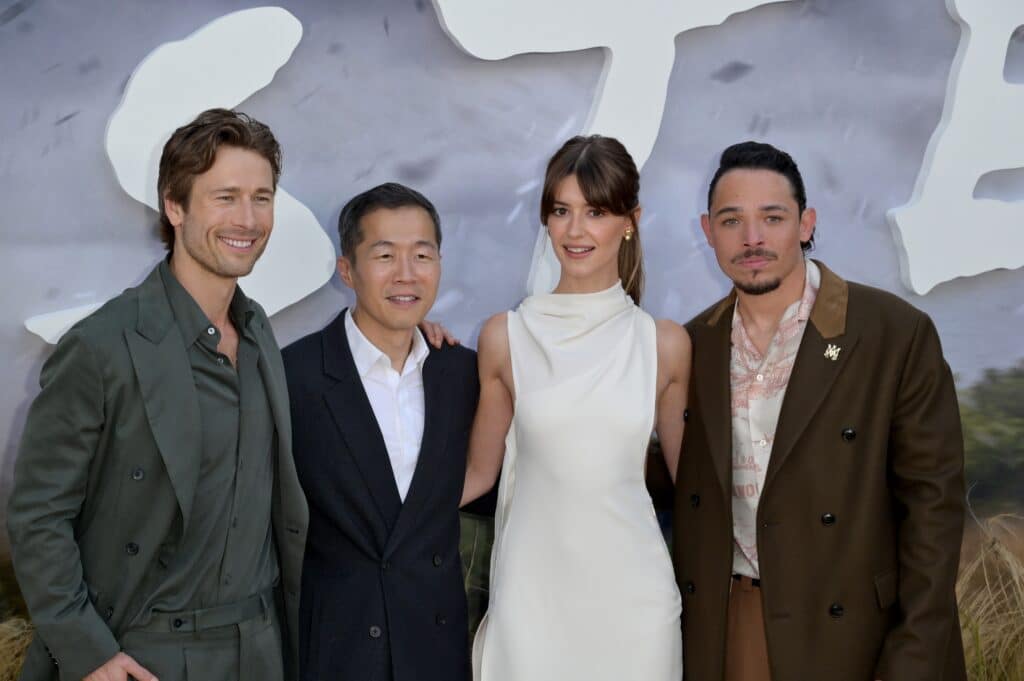 Twisters (2024) cast and crew from left to right: Glen Powell, director Lee Isaac Chung, Daisy Edgar-Jones, and Anthony Ramos. Credit: Shutterstock/Featureflash Photo Agency