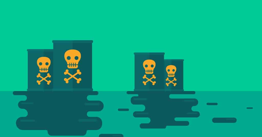 Toxic metals and chemicals in barrels with skulls on them. Green tones.