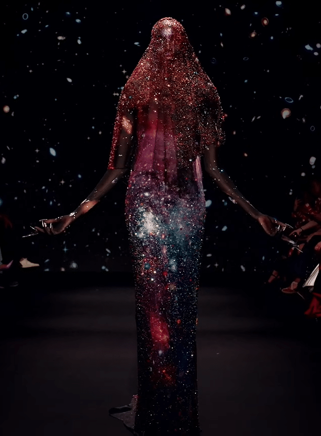 A dress that looks like it is made of space.