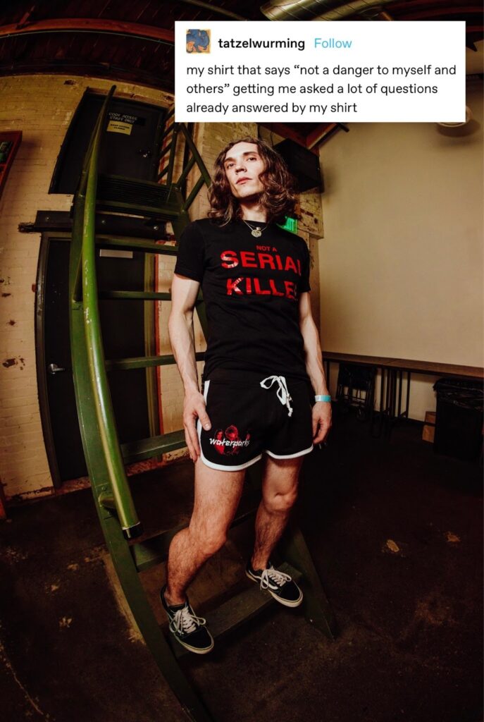 Otto Wood wearing a shirt that says "Not a Serial Killer"