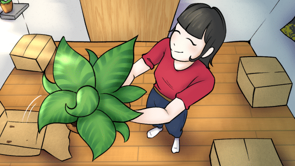 A women in her new empty dorm unpacking moving boxes and holding up her new plant décor.