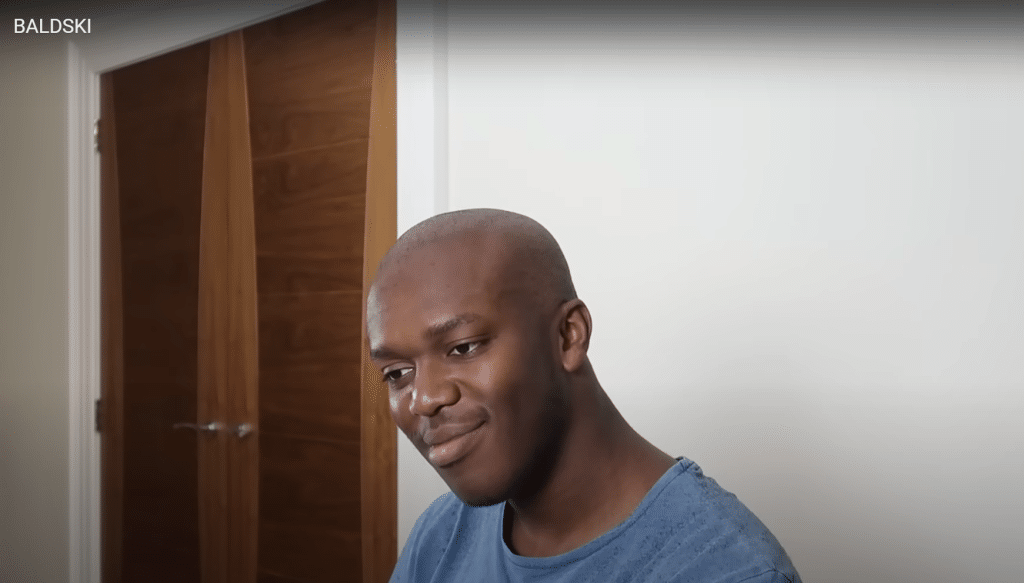 KSI bald after shaving his head.