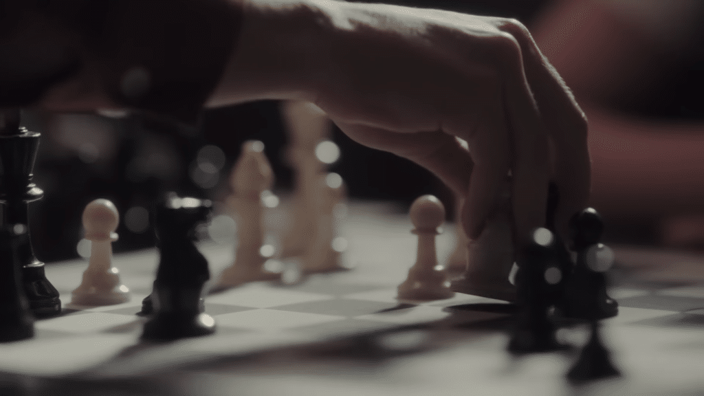 a shot of a chess board, from the queen's gambit