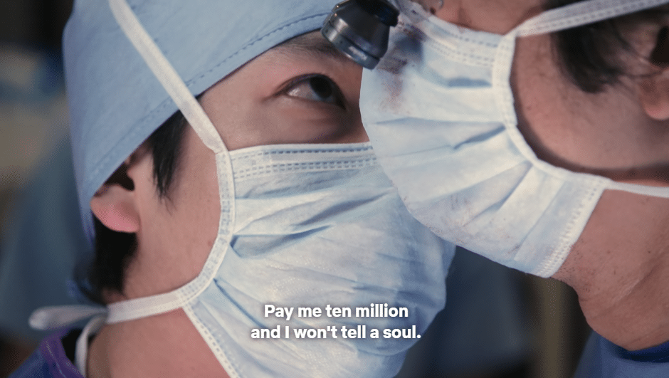Dressed in surgical clothes, Tokai gets in the face of another doctor. Bottom text reads "Pay me ten million and I won't tell a soul"