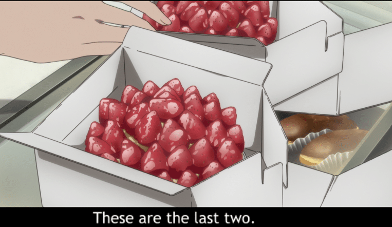 An animated picture of 2 boxed cakes with 20 strawberries on them being given as takeout.