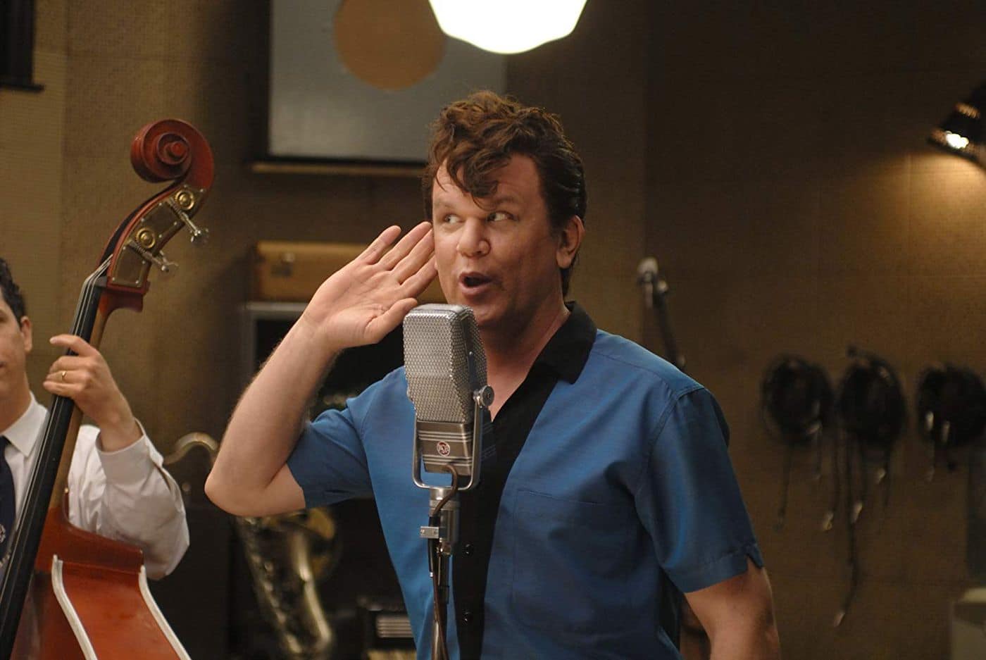 Dewey Cox (John C. Reilly) at the recording studio.