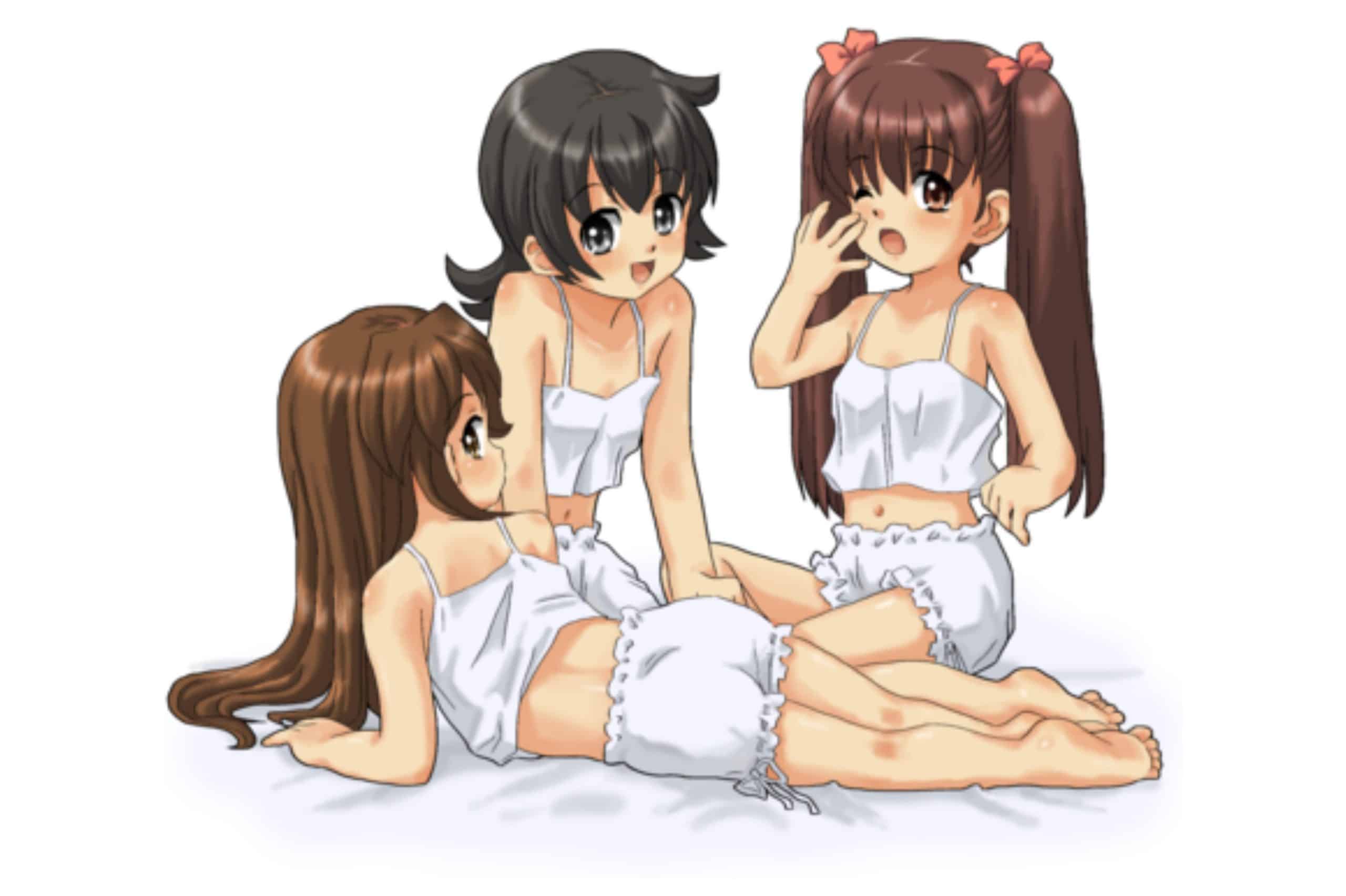 A trio of young girls are dressed in white two-piece sleepwear. One is lying on her side, with her butt clearly pronounced.