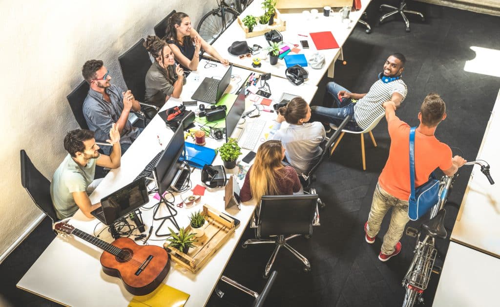 Millennial entrepreneur group working at office startup - corporate fashion