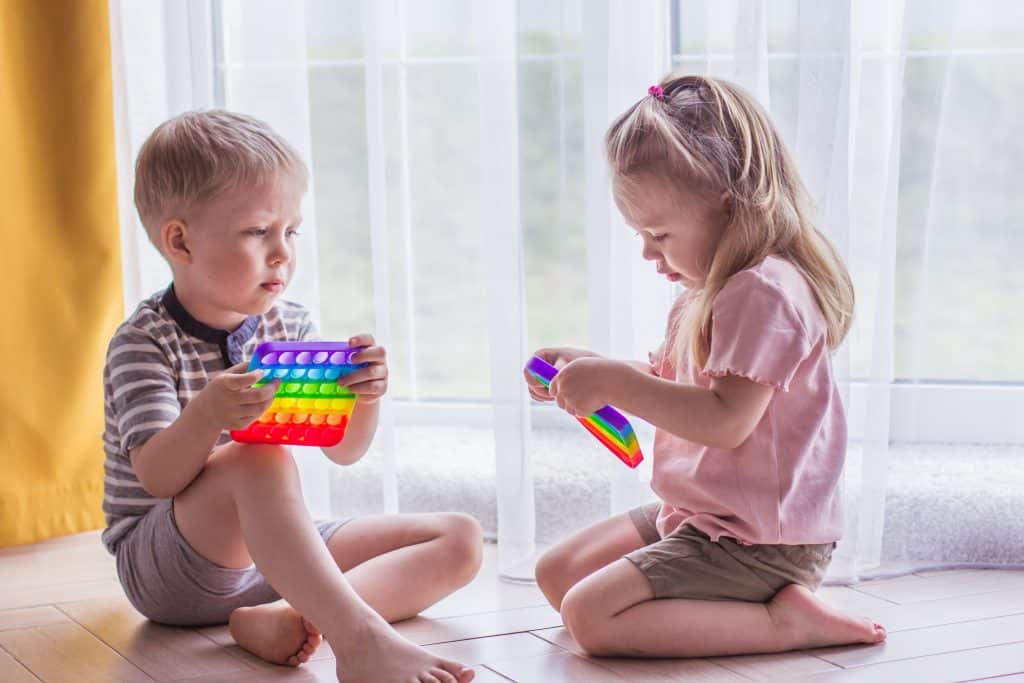 Children play with sensory toys