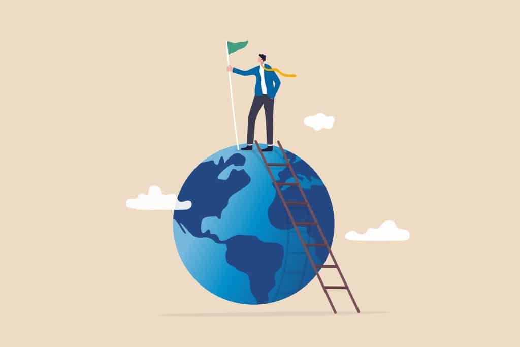 An illustration of a person climbing to the top of the globe via a ladder and planting a flag. In this case, demonstrative of opportunities presented by gig economy and AI.