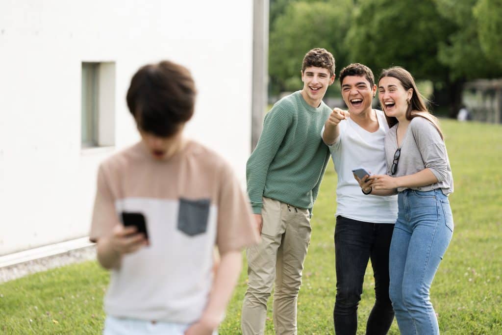 Teenagers Engaging In Cyberbullying