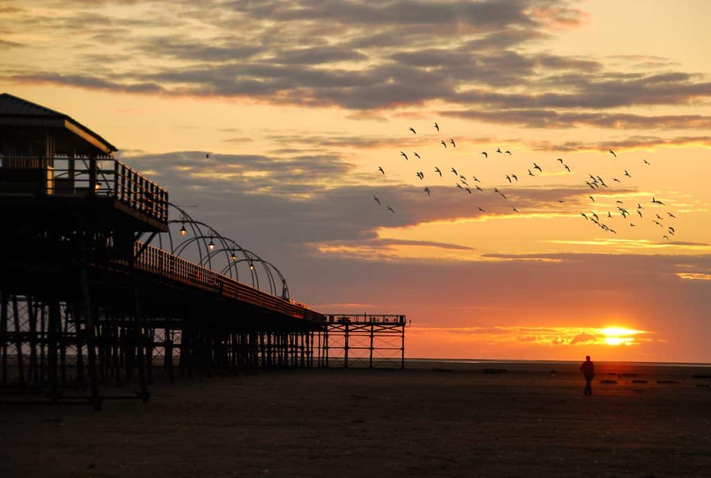 Southport Pier With The Sunset Behind It.