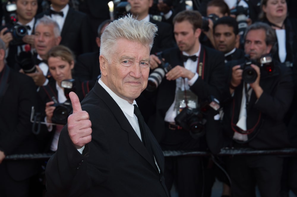 David Lynch at the 70th Anniversary Gala for Festival de Cannes. He is smiling and giving a thumbs up.