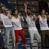 From left to right: Satoshi Ohno, Jun Matsumoto, Kazuari Ninomiya, Masaki Aiba, and Sho Sakurai wearing 5x10 anniversary shirts at their concert encore