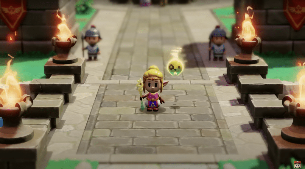 Zelda stands on a bridge with her fairy companion in Echoes of Wisdom