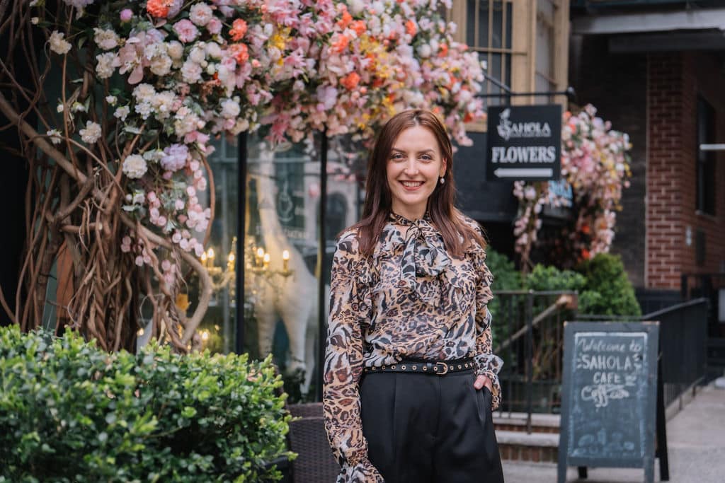Olga Sagraoui in front of Sahola Flowers.