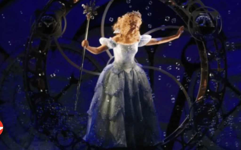Glinda in her blue dress in Wicked on Broadway.