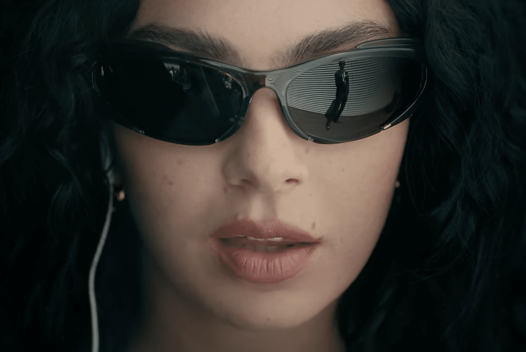 Charli XCX close up in sunglasses