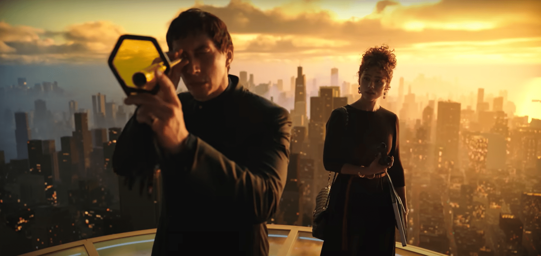 Cesar (Adam Driver) and Julia (Nathalie Emmanuel) overlook New Rome. Credit: YouTube/Lionsgate Movies