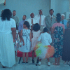 The daughters and fathers line up to dance.