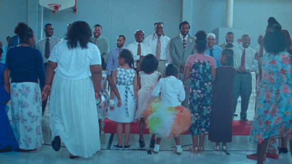 The daughters and fathers line up to dance.