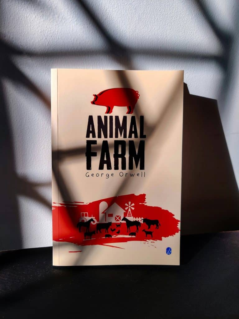 Red, black, and tan Animal Farm book cover