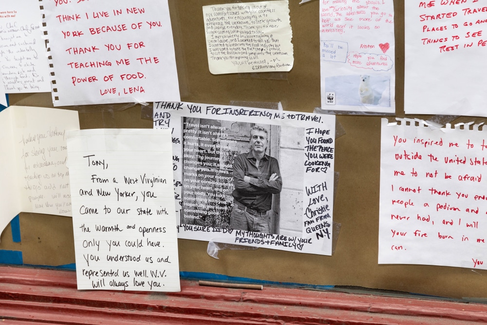 Flowers and Photo Memorabilia are placed in Honor of The Death of Anthony Bourdain in Front of Les Halles Restaurant June 10, 2018 in New York City.