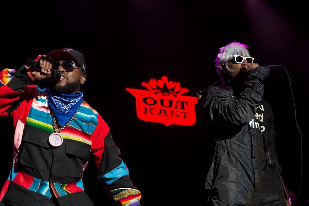 From left to right, Big Boi and Andre 3000 performing on stage.